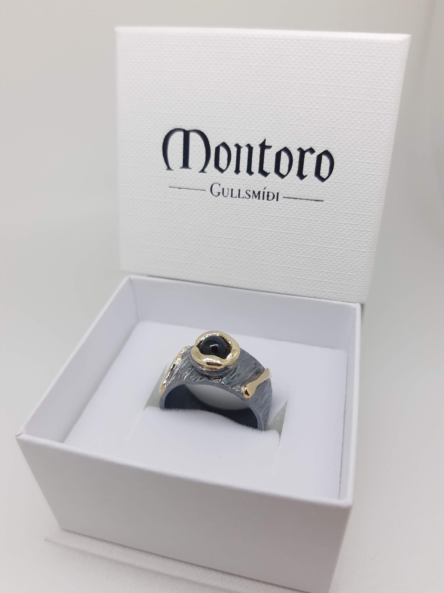 Bague en argent et or