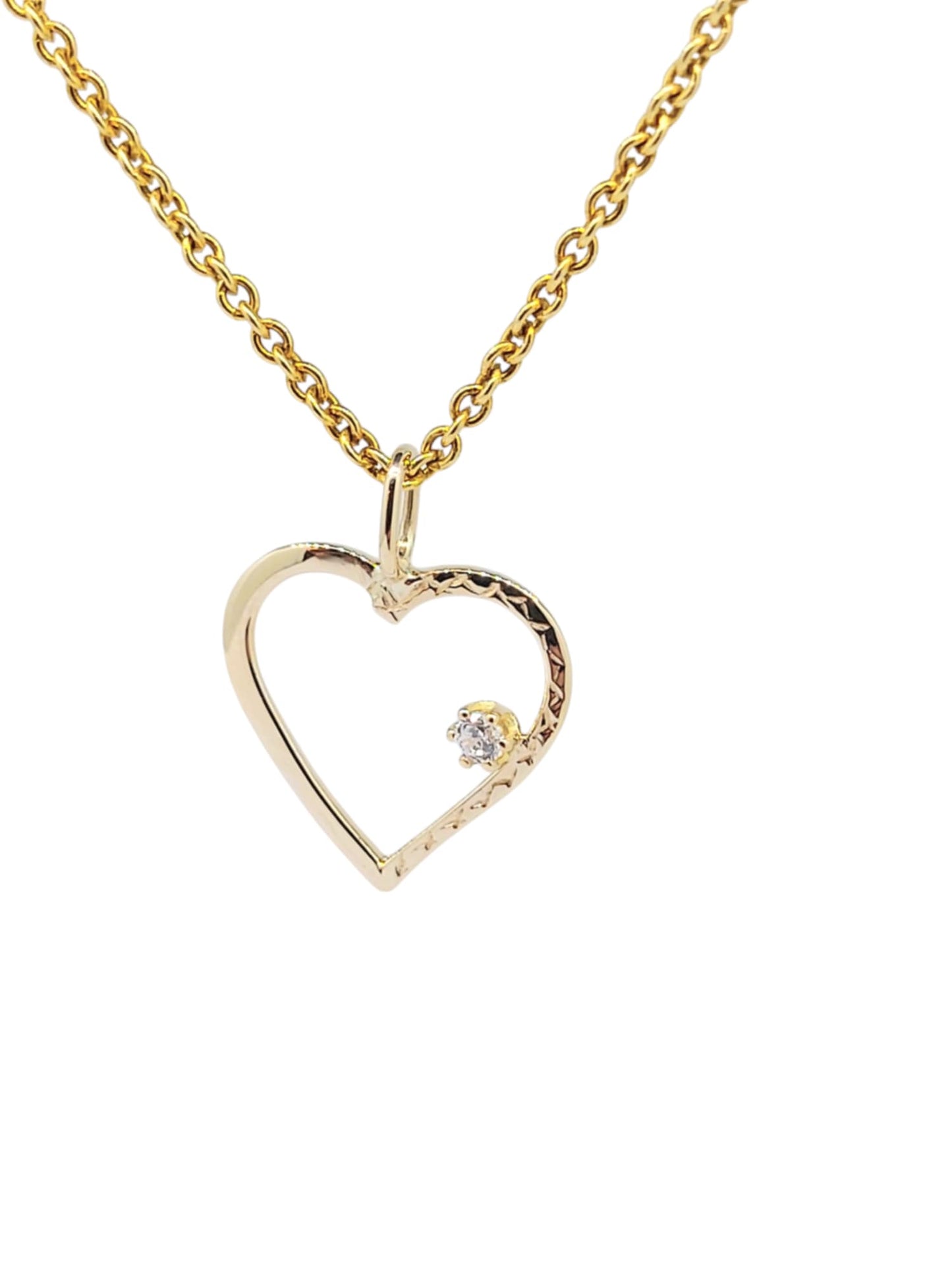 heart gold and zirkon,hannað og smiðað á Islandi af Montoro Gullsmiði.